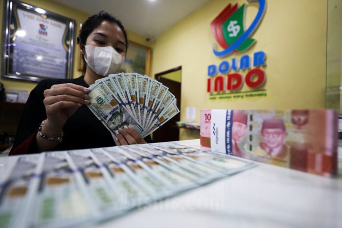 Prediksi Nilai Tukar Rupiah terhadap Dolar AS Pekan Depan, Senin (16/12)